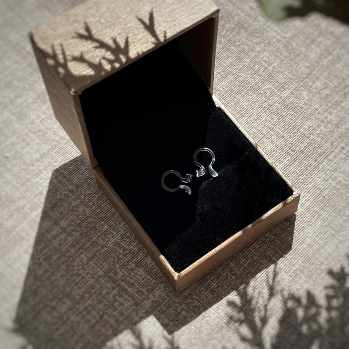 Tuckies™ Ear Aligners