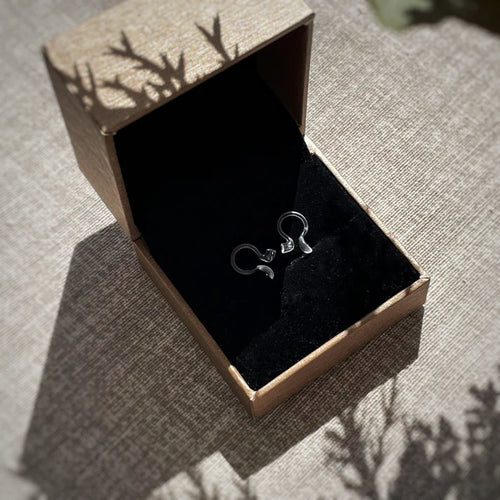 Tuckies™ Ear Aligners